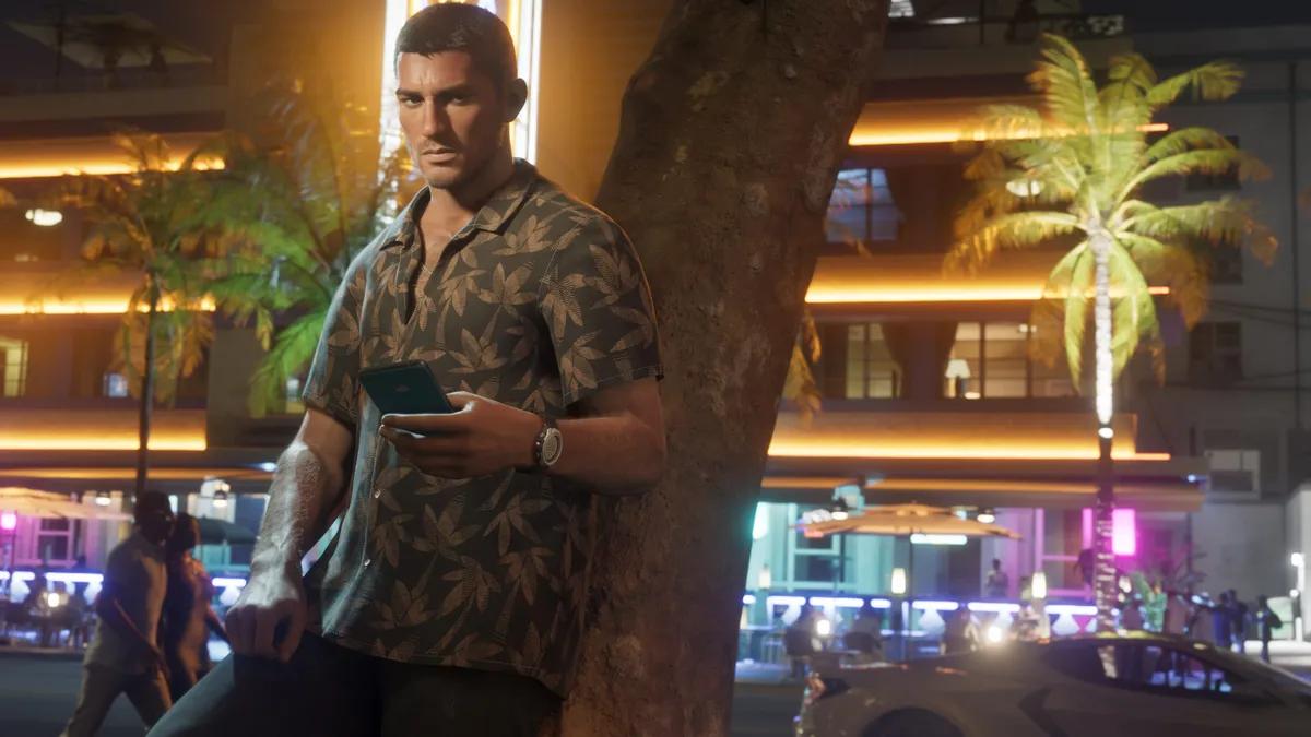 GTA 6 character Jason standing next to a customized muscle car in a Vice City alleyway